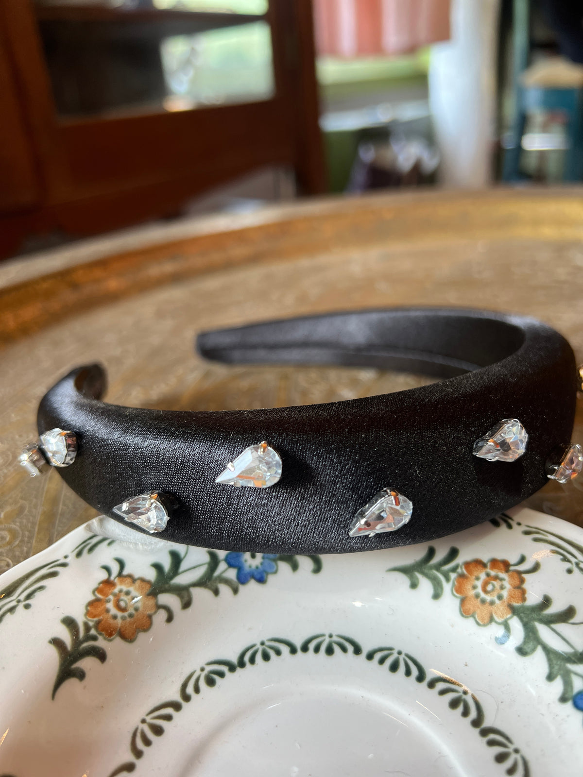 A thick black bow combined with Swarovski dots