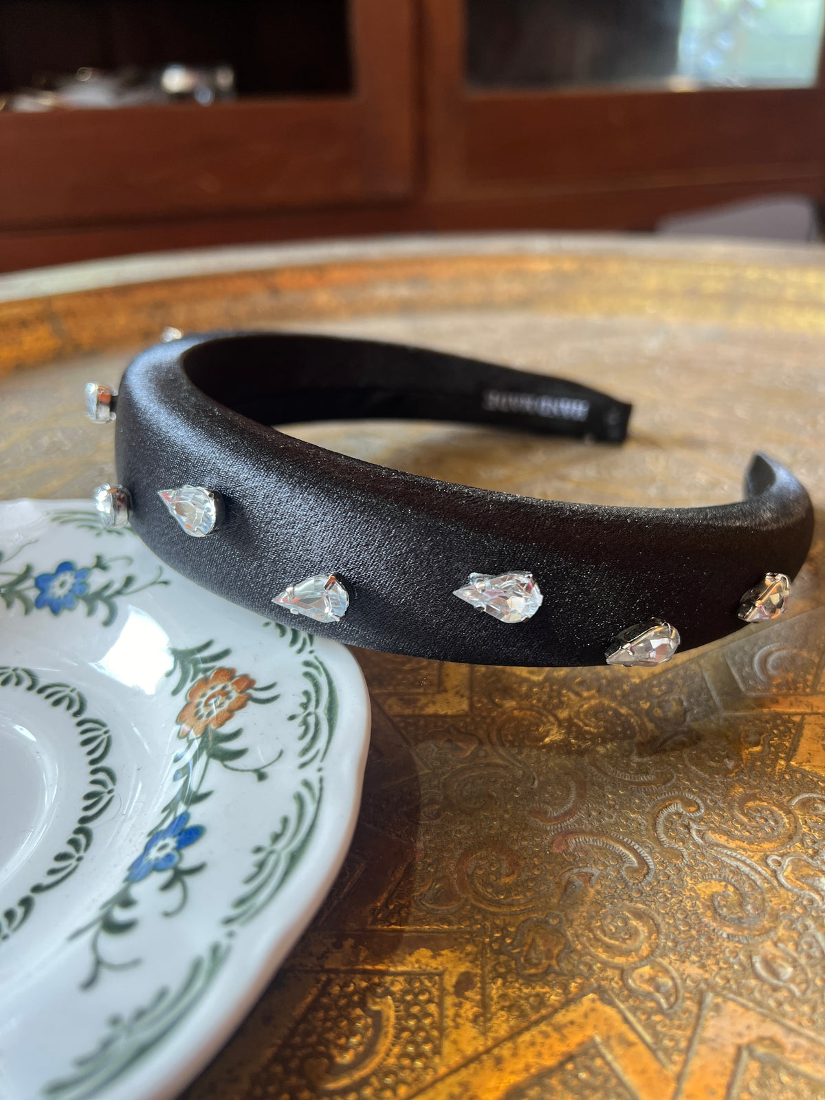 A thick black bow combined with Swarovski dots