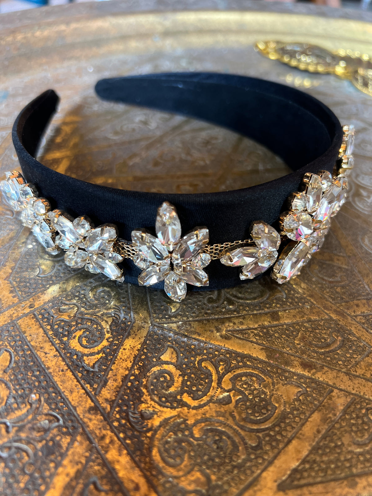 A black bow combined with Swarovski stones
