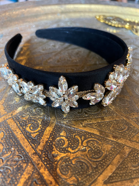 A black bow combined with Swarovski stones