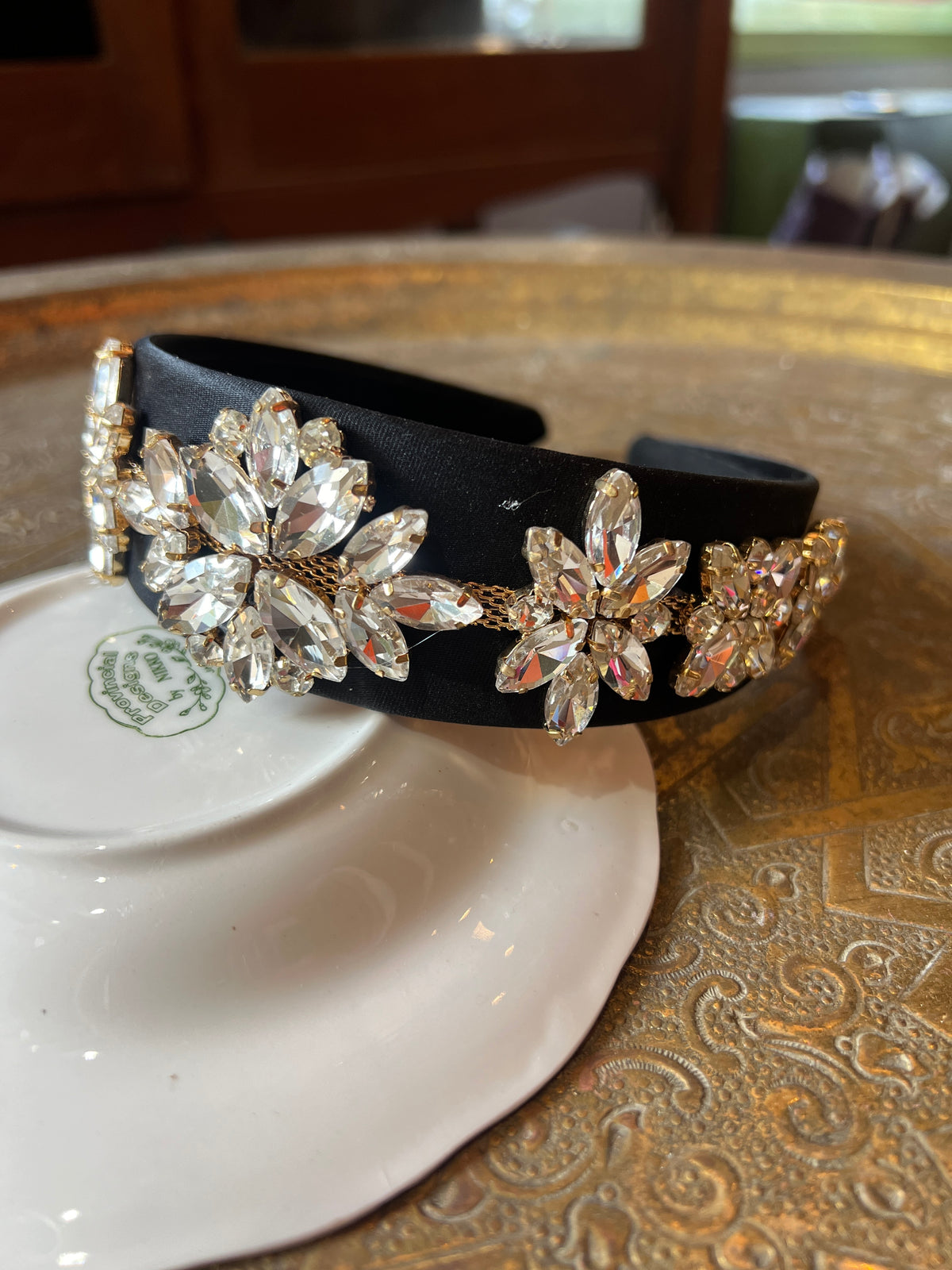 A black bow combined with Swarovski stones