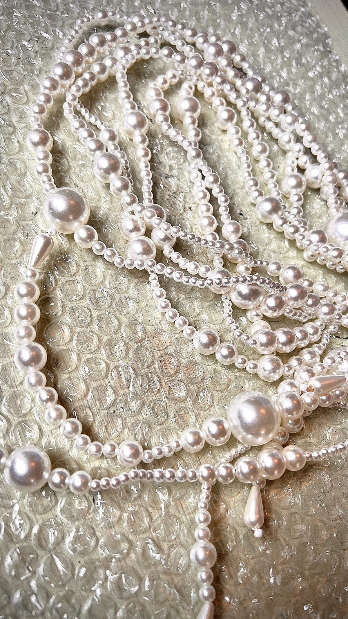 Long pearl necklace