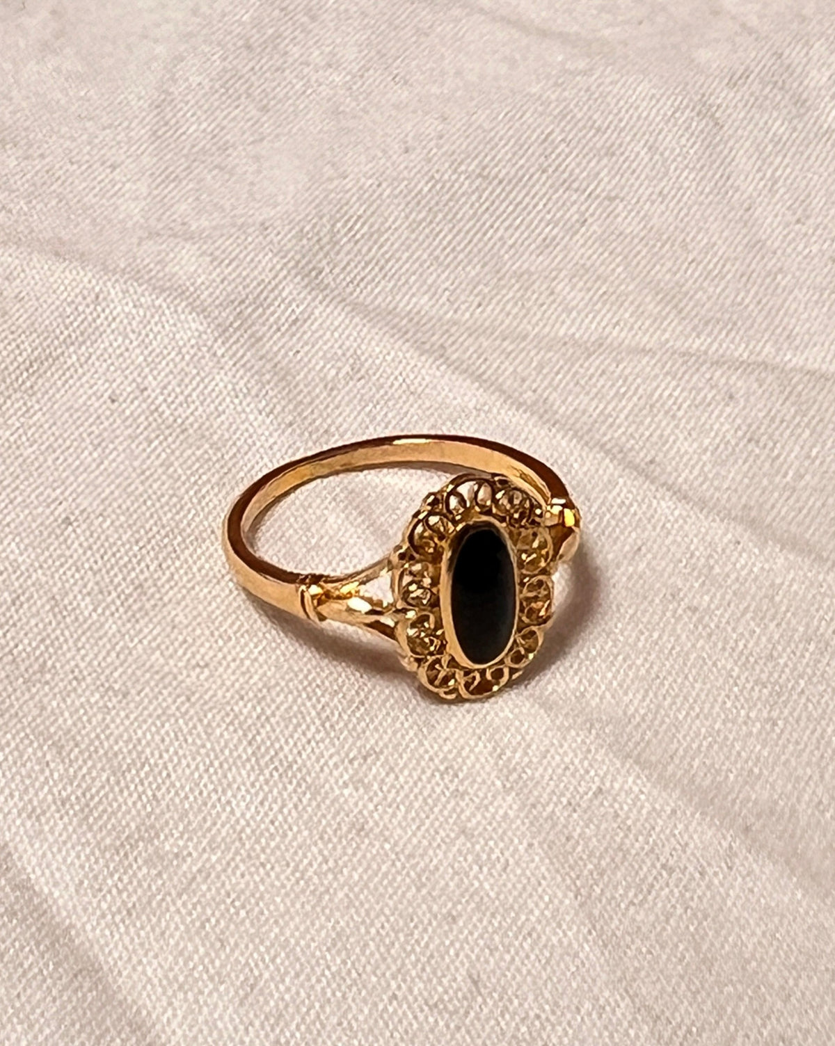Elliptical Gold Plated Black Stone Ring