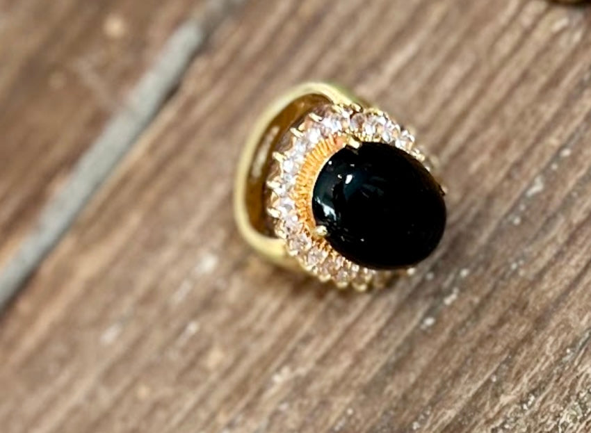 An ancient gold ring combined with a dominant black stone