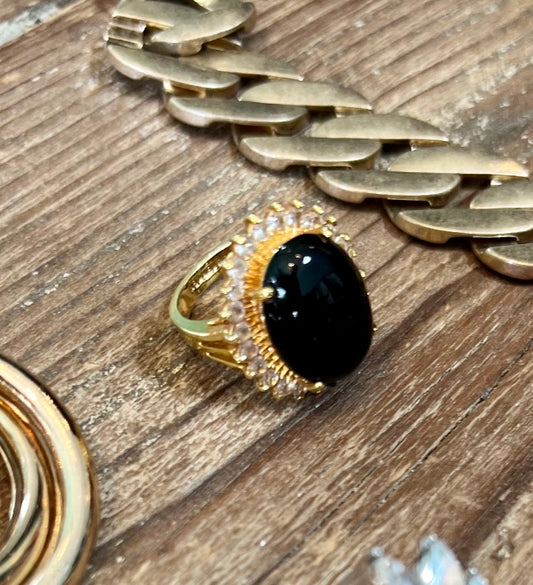 An ancient gold ring combined with a dominant black stone