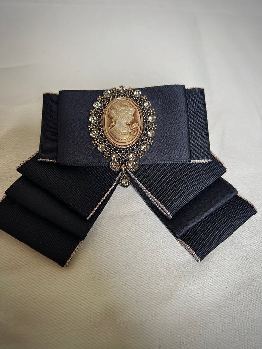 Black bow tie pin for a retro design garment