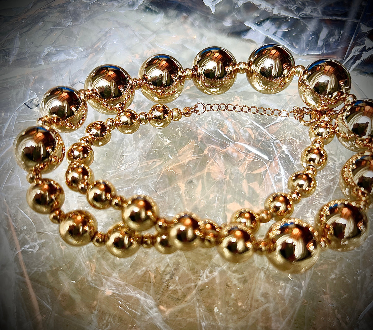 A necklace of round gold beads