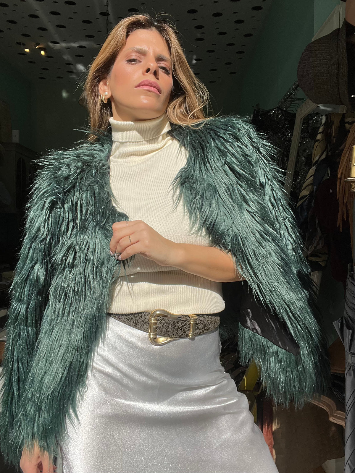 Dark green fur-like coat